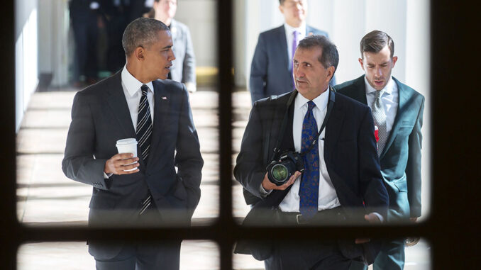 President Barack Obama walks along the West Colonnade of the White House with Chief White House Photographer Pete Souza Feb. 18, 2016. (Official White House Photo by Lawrence Jackson)
